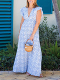 Vestido largo azul con medallón, cuello en V y mangas de volantes