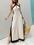 Robe longue fendue à blocs de couleur et col licou
