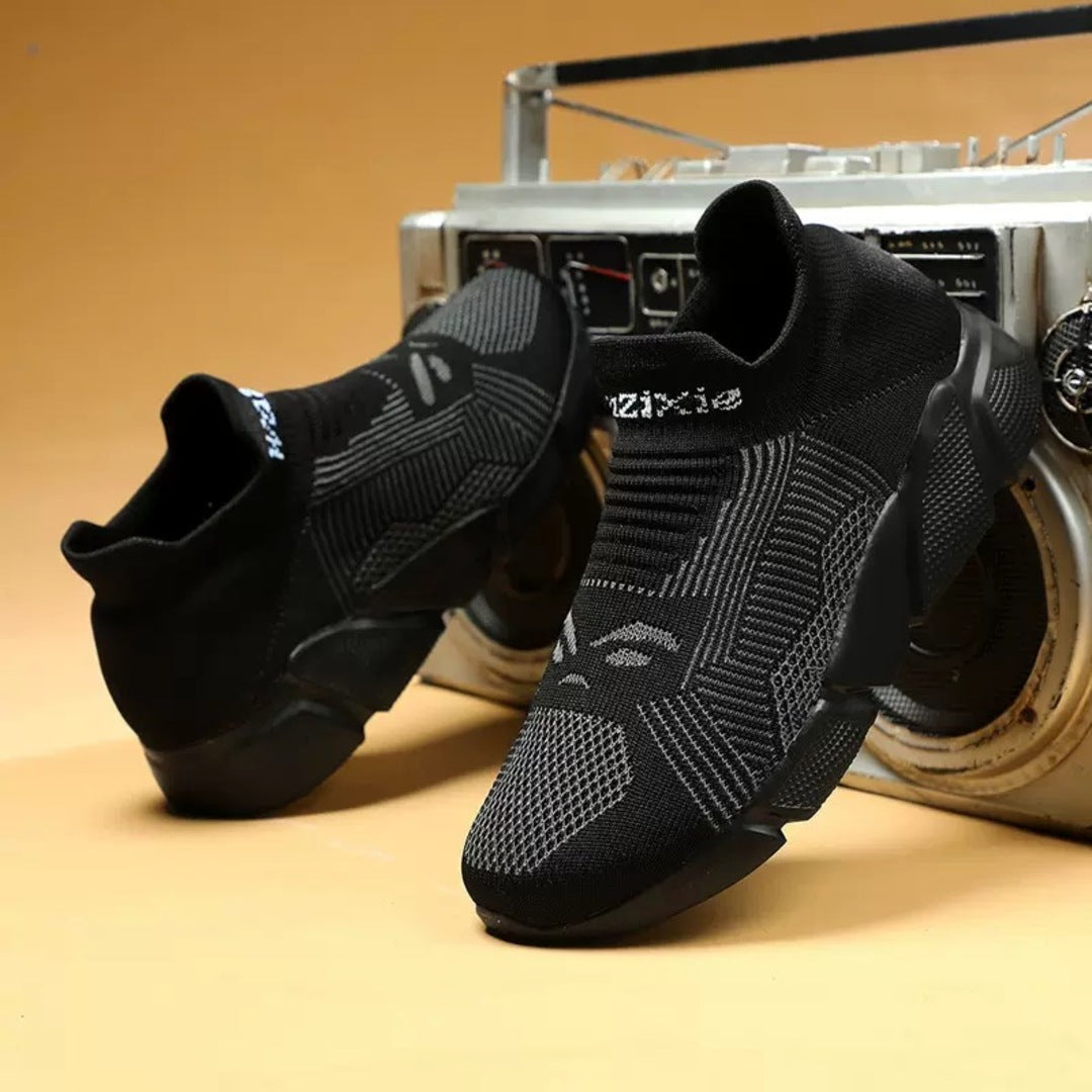 Monofärgade stickade sneakers