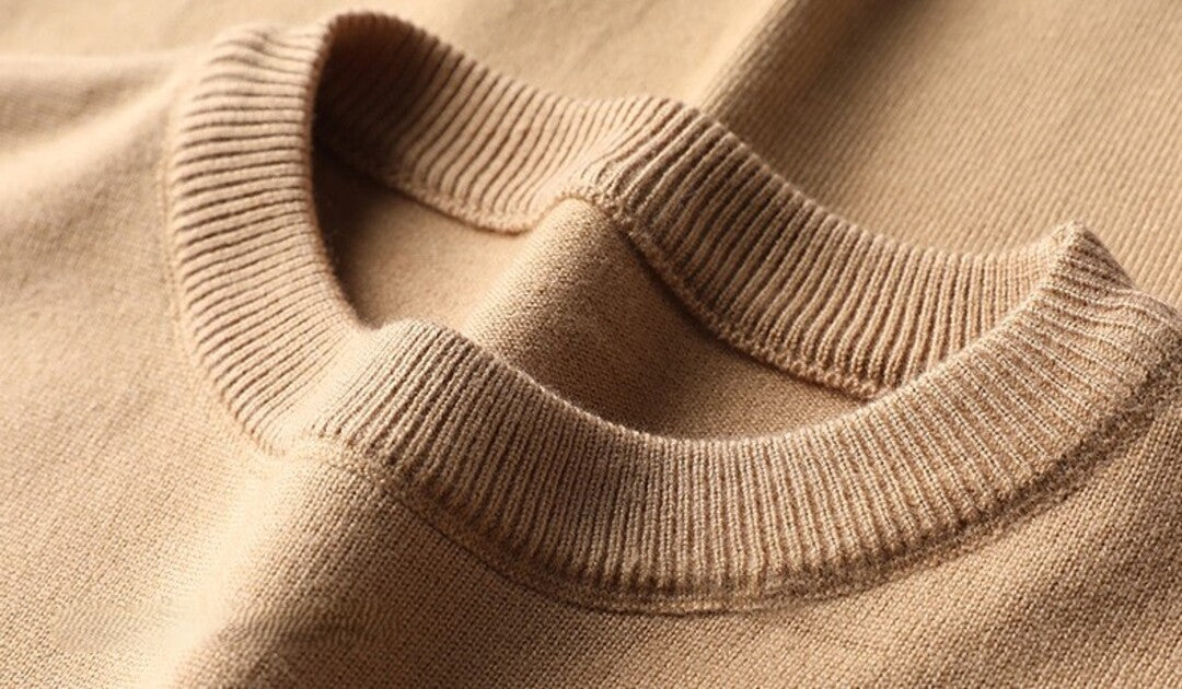 Strikket sweater med striber