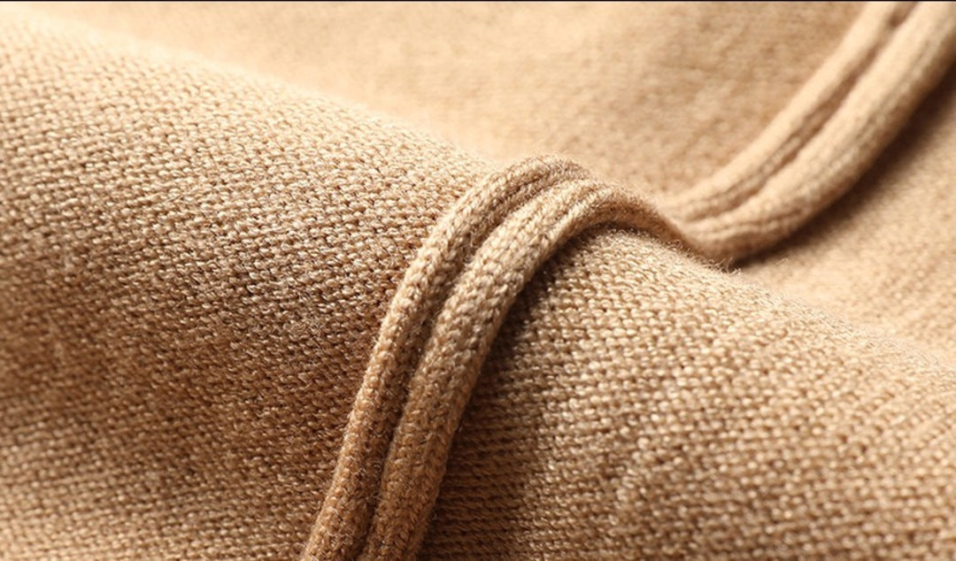 Strikket sweater med striber