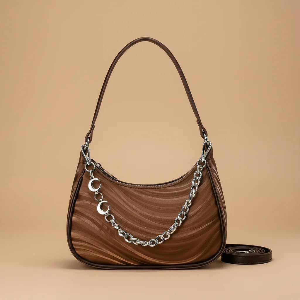 Corinne-Tasche