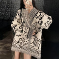 CORALIE FRINGE CARDIGAN