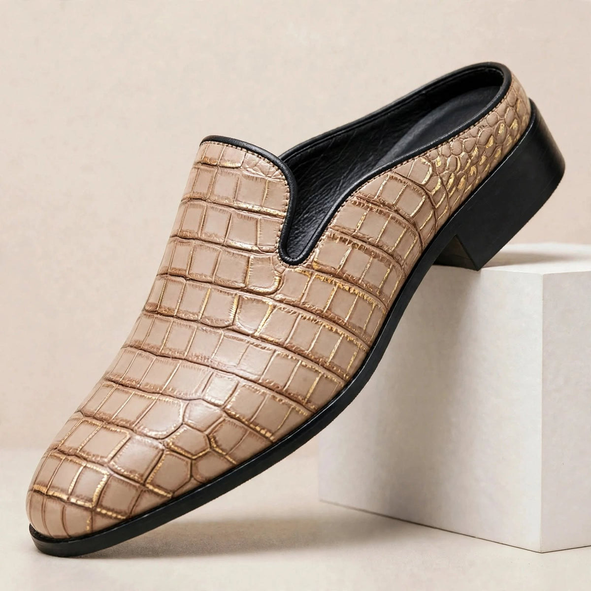 Mules Daryl de cuero genuino con punta redonda