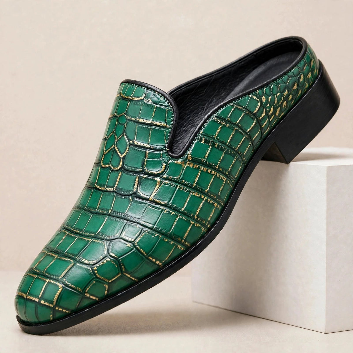 Mules Daryl de cuero genuino con punta redonda