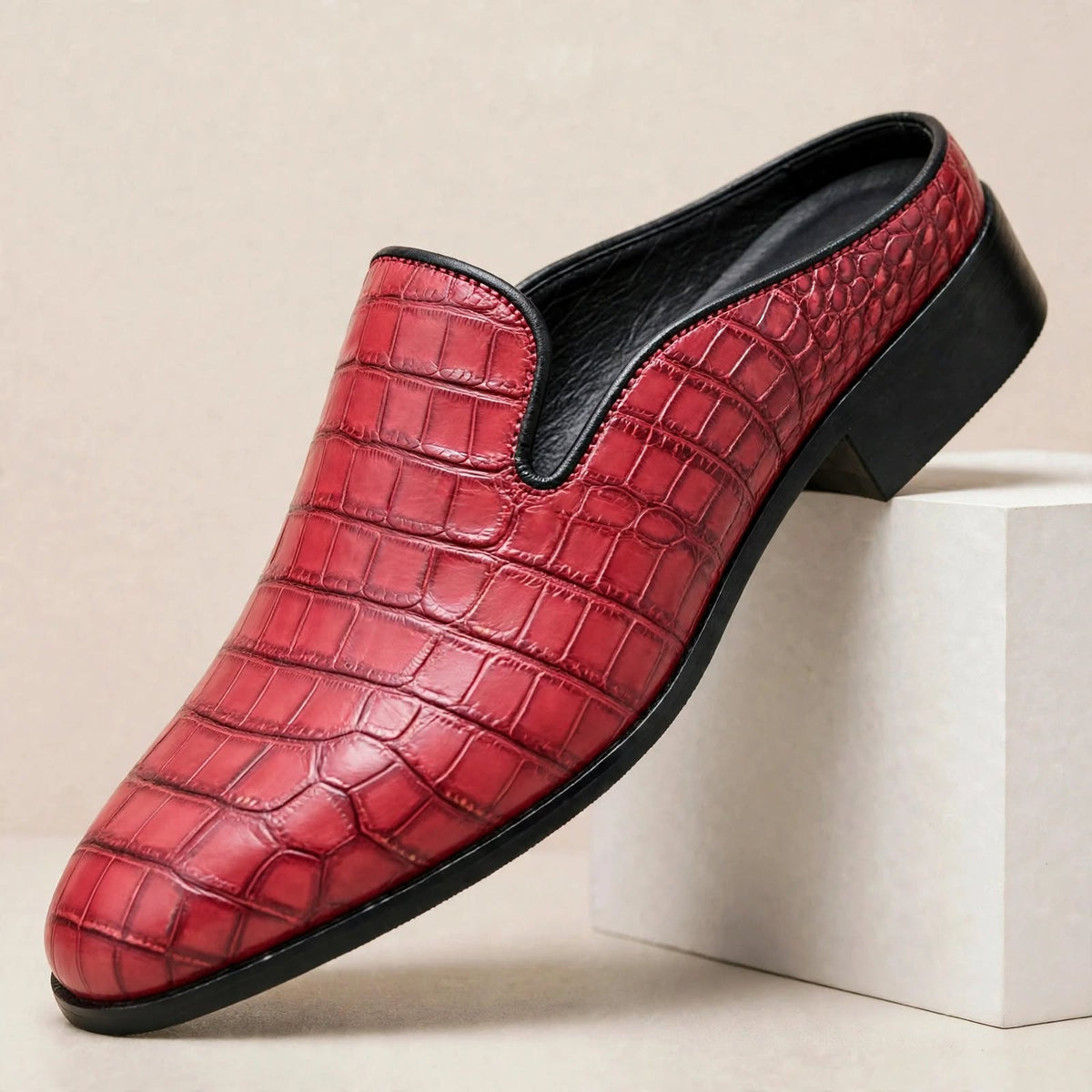 Mules Daryl de cuero genuino con punta redonda